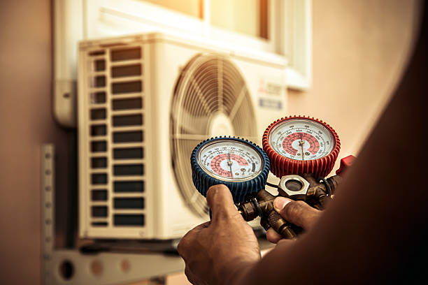 Professional Heat Pump Repair technician working in Naples, FL